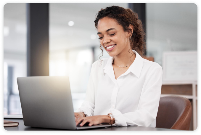 Woman typing on laptop